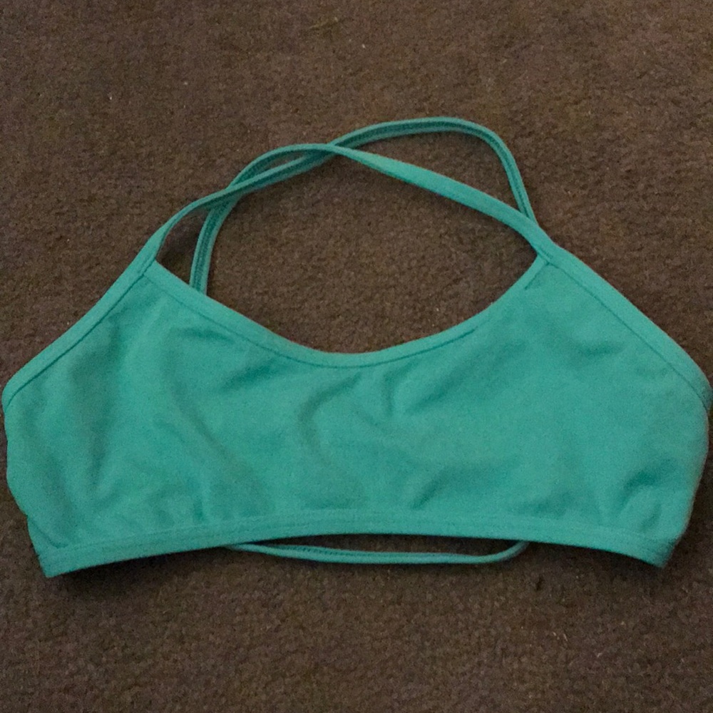 Jolyn fitted Teal “Xavier” Top with cross back